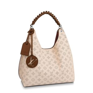 LV cream colored distressed perforated calf leather shoulder bag