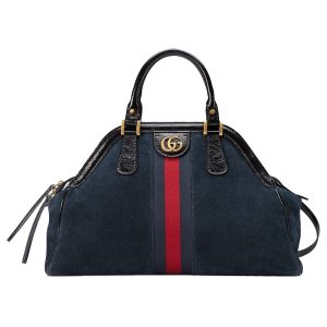 Gucci vintage leather handbag material