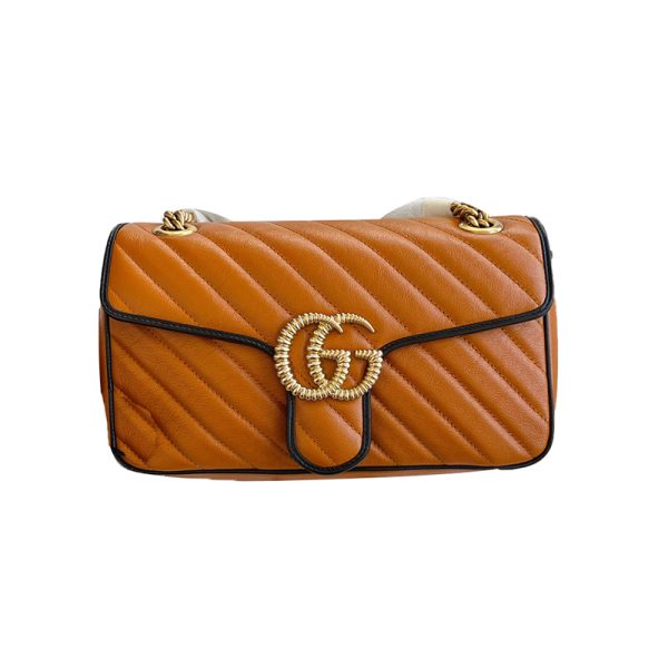 Gucci pumpkin colored black border bag